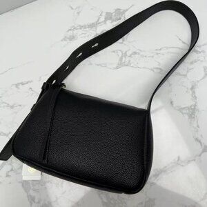 Tory Burch black leather shoulder bag.